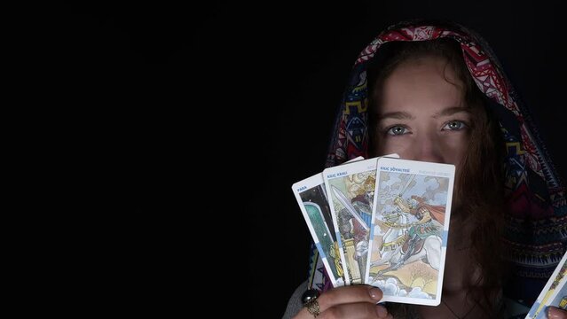 Young Girl with a Scarf Showing Tarot Cards