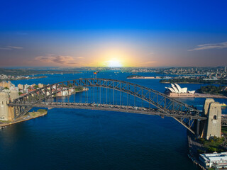 Sydney Harbour Australia with nice colours in the sky. Nice blue water of the Harbour, high rise offices and residential buildings of the City in the background, NSW Australia