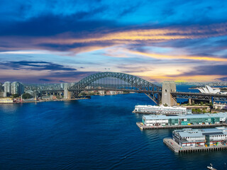 Sydney Harbour Australia with nice colours in the sky. Nice blue water of the Harbour, high rise offices and residential buildings of the City in the background, NSW Australia
