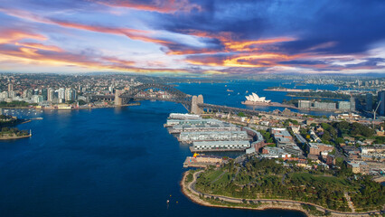 Sydney Harbour Australia with nice colours in the sky. Nice blue water of the Harbour, high rise offices and residential buildings of the City in the background, NSW Australia