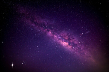 purple  night sky milky way and star on dark background.Universe filled with stars, nebula and...