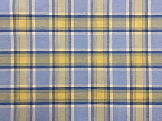 Colored checkered table cloth background. Texture of textile table napkin. Multicoloured gingham background.