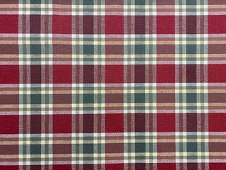 Colored checkered table cloth background. Texture of textile table napkin. Multicoloured gingham background.