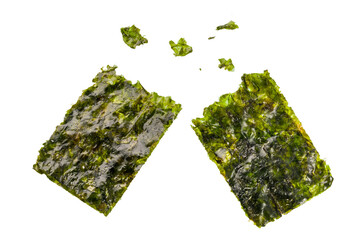 Crispy nori sheets tear off with some pieces on white background.  - obrazy, fototapety, plakaty