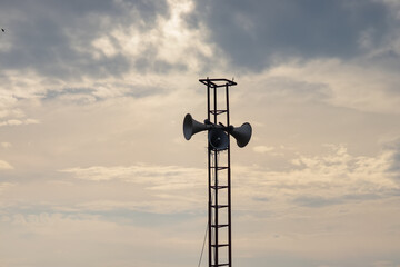 Close up of a megaphone of a local information center. Rural radio and announcer