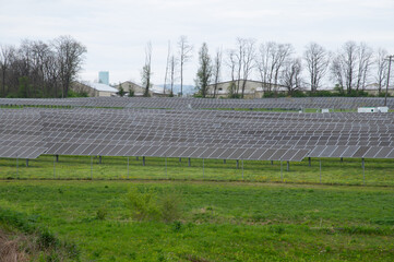 Fototapeta premium Many solar panels at the field horizontal orientation, gray panels