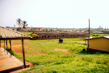 Wide view of a government school compound in Ghana. Rural area school