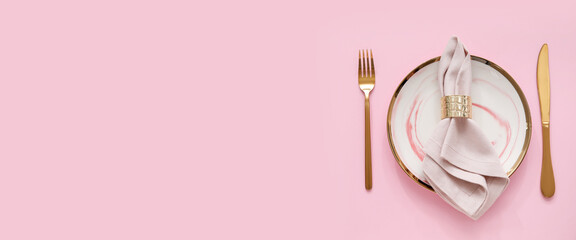 Stylish table setting on pink background with space for text