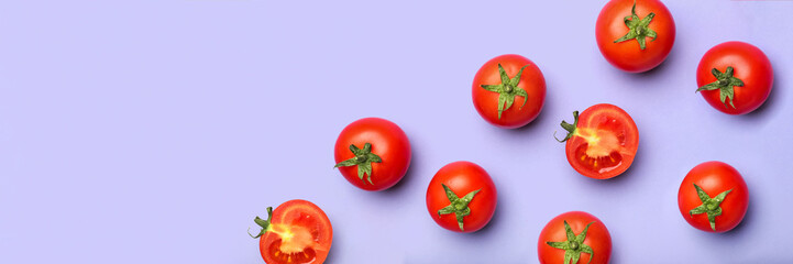 Fresh ripe tomatoes on lilac background with space for text