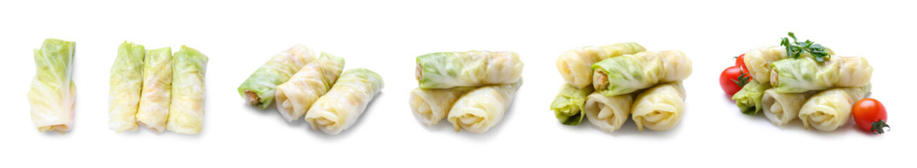 Set of uncooked cabbage rolls on white background
