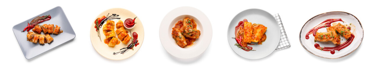 Set of plates with tasty stuffed cabbage rolls on white background, top view