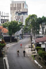 Fototapeta premium Bandung, Indonesian - April 28, 2022 : People are cycling around the city of Bandung