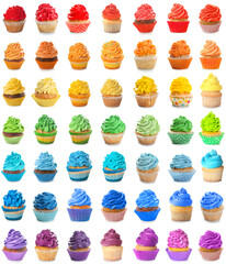 Set of colorful cupcakes on white background