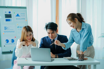 Group of 3 young Asian businessmen discussing business in a brainstorming conference room to start a new business in a modern office.