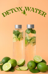 Bottles of fresh detox water with lime on color background