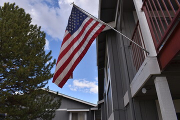 american flag on a building