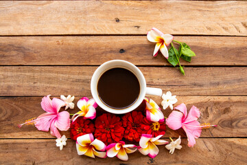 hot coffee espresso with colorful flowers arrangement flat lay postcard style on background wooden