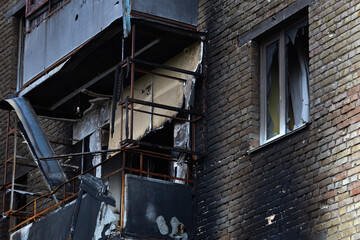 War of Russia against Ukraine. A residential building damaged by an enemy aircraft in the Ukrainian. Consequences of the war, damaged grocery market by the troops of the Russian army.