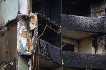Fototapeta na wymiar War of Russia against Ukraine. A residential building damaged by an enemy aircraft in the Ukrainian. Consequences of the war, damaged grocery market by the troops of the Russian army.