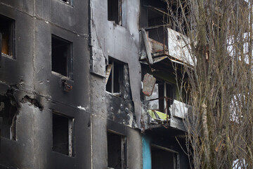 War of Russia against Ukraine. A residential building damaged by an enemy aircraft in the Ukrainian. Consequences of the war, damaged grocery market by the troops of the Russian army.