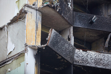 War of Russia against Ukraine. A residential building damaged by an enemy aircraft in the Ukrainian. Consequences of the war, damaged grocery market by the troops of the Russian army.