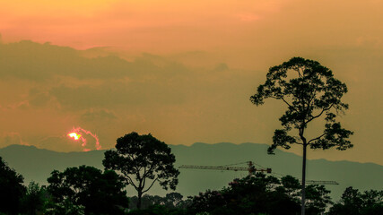 Panoramic wallpaper of seaside evening scenery, with small fishing boats of villagers docked, with blurred waves, a beautiful way of life, community that lives on the waterfront.
