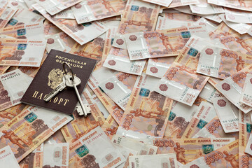 Russian rubles, cash are on the desk in the office. 5000 rubles. Keys and passport are on top. Buying a house