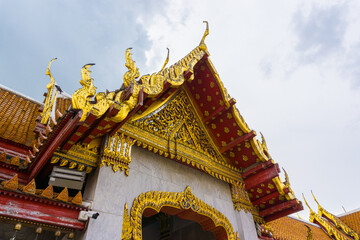 Golden pagoda of marble busshist temple sightseeing in Bangkok city travel
