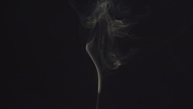 The steam smoke of on a black background. It is abstract.