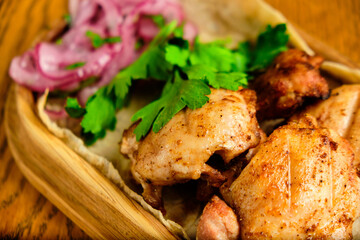 Chicken, Salmon and Meat Shish Kebabs on Parchment with Sauces Top View