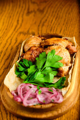 Chicken, Salmon and Meat Shish Kebabs on Parchment with Sauces Top View