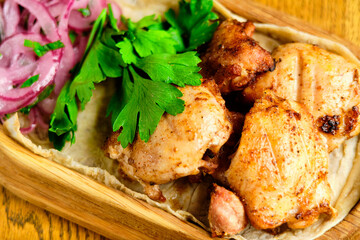 Chicken, Salmon and Meat Shish Kebabs on Parchment with Sauces Top View