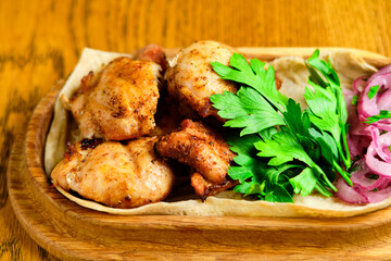 Chicken, Salmon and Meat Shish Kebabs on Parchment with Sauces Top View