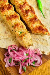 Juicy toasted kebab gyroscopic sausage Lyulya Minced