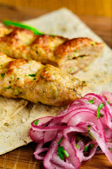 Juicy toasted kebab gyroscopic sausage Lyulya Minced