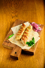Juicy toasted kebab gyroscopic sausage Lyulya Minced