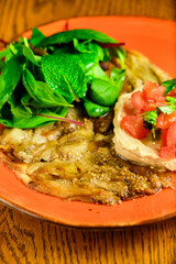 Pasta tartare with basil leaves