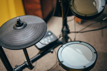 Electric drum kit. A drum cymbal. A drum barrel. Silent percussion instruments.
