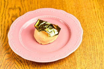 Dessert cake with gold foil