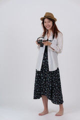 Image of happy young woman with camera isolate over white background. Travel and Summer concept.