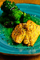 Fried chicken breast with broccoli