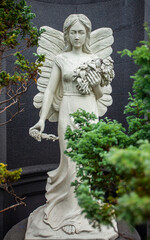 Very beautiful elegant female angel statue in roman style 