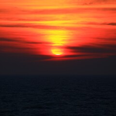 Dark orange shot of sunset over the Baltic Sea