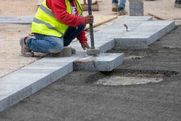 Cobblestone sidewalk construction © Ocskay Mark