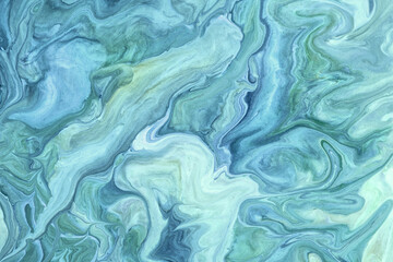 Abstract fluid art background light blue and cerulean colors. Liquid marble. Acrylic painting with turquoise gradient