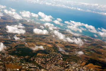 Aerial view of clouds above seaside © Yury Kirillov