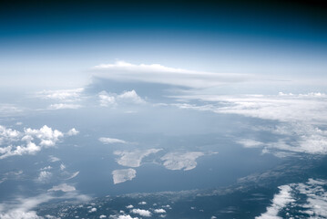 Naklejka na ściany i meble Aerial view of clouds above the sea