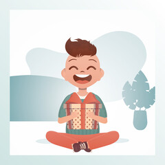 Happy child boy sits in a lotus position and holds a gift with a bow in his hands. Holidays theme. Cartoon style. Vector illustration.