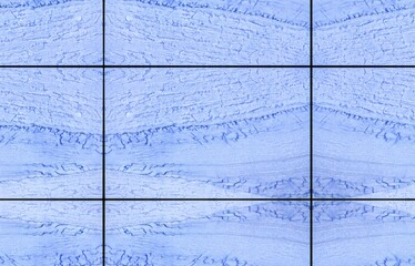 Seamlessly tileable texture of blue marble tiles