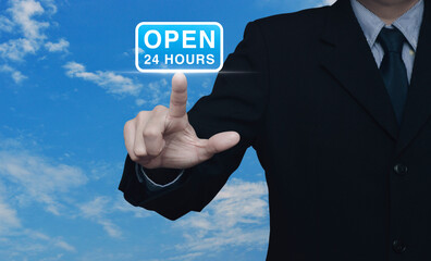 Businessman pressing open 24 hours flat icon over blue sky with white clouds, Business full time service concept